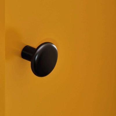 Round knob installed on door without rose