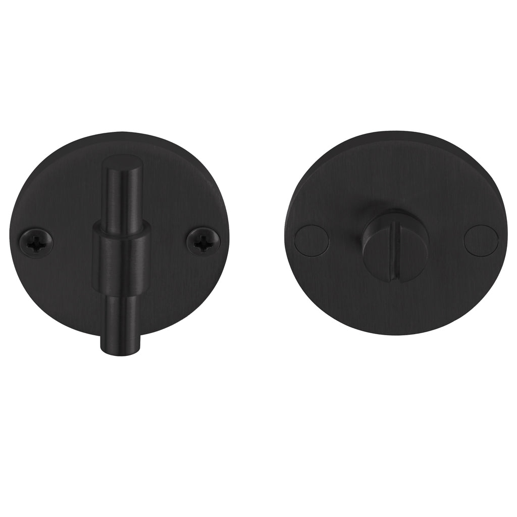 A pair of Formani ONE by Piet Boon PBWC50/5 black round knobs on a white background.