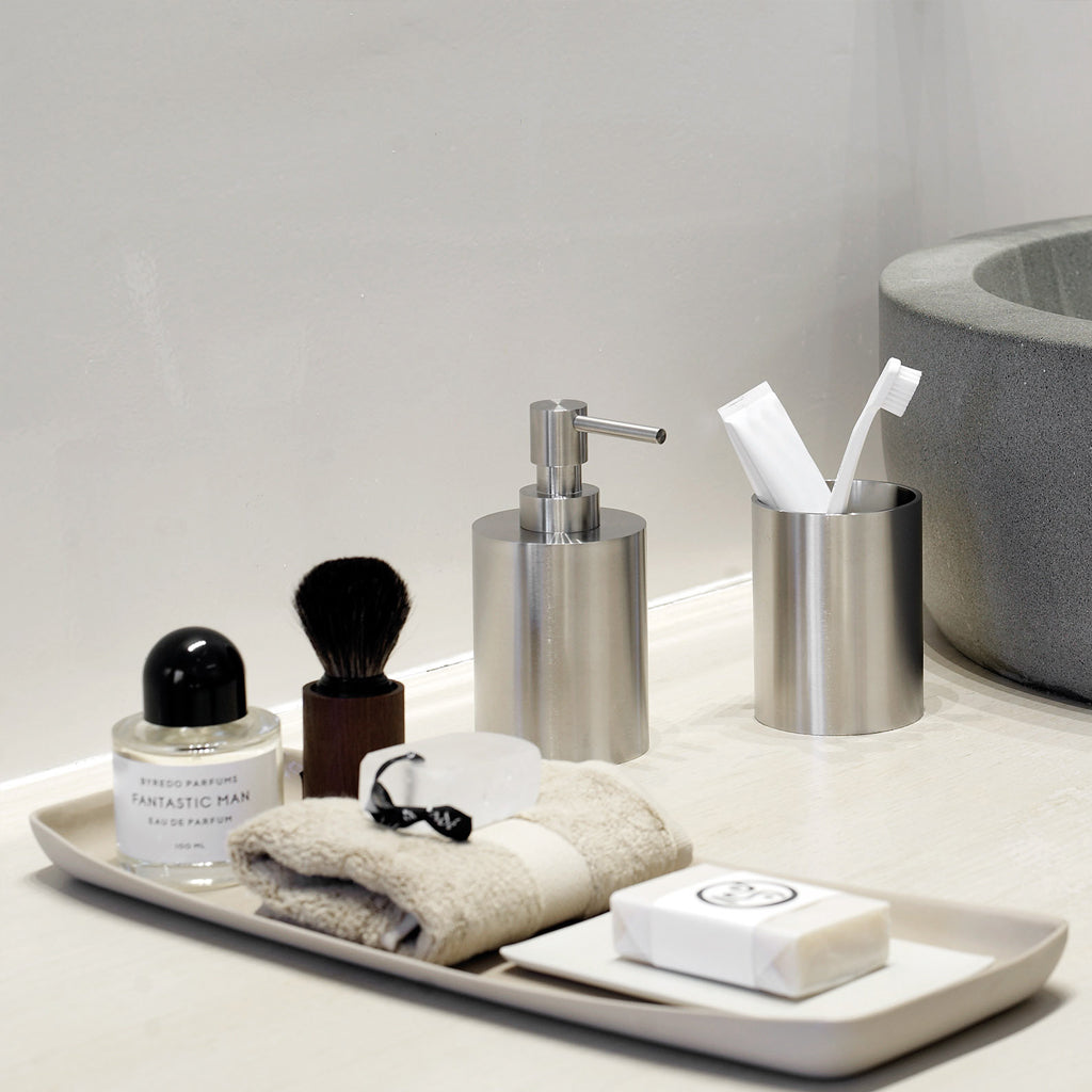 A bathroom counter with a ONE by Piet Boon Soap Dispenser from Formani.