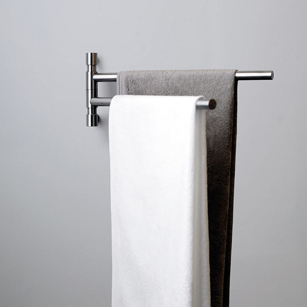 A ONE by Piet Boon Towel Bar Swivel by Formani hanging on a towel rack in a bathroom.