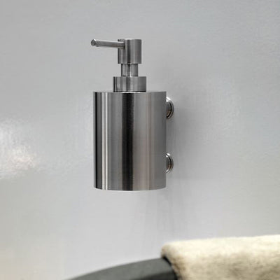 A ONE by Piet Boon Wall Mounted Soap Dispenser mounted on a wall, by Formani.