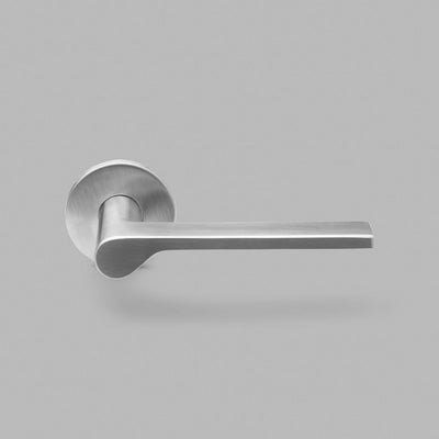 A close up of a d line ONEN Lever door handle on a gray background.