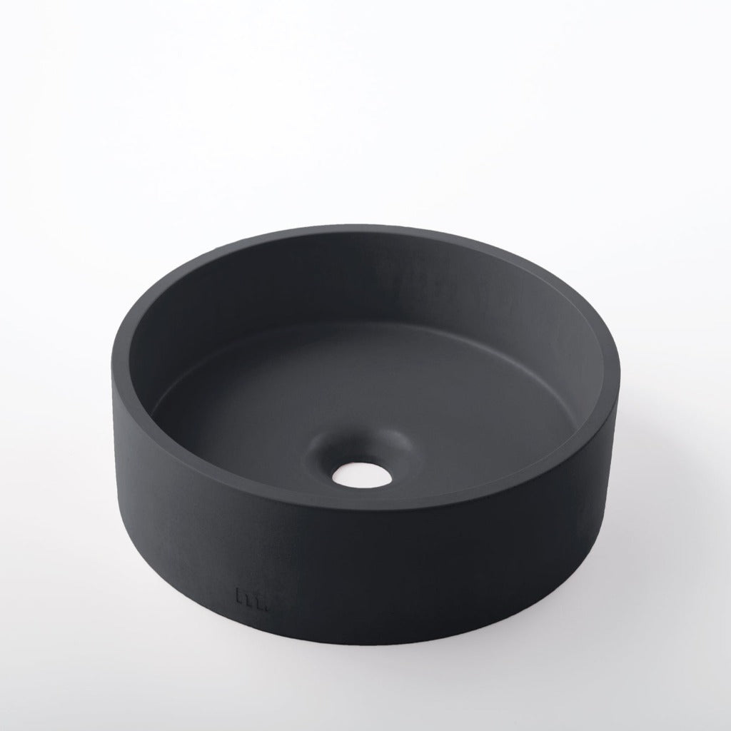 A Mudd. Concrete Odet Basin SM on a white surface.