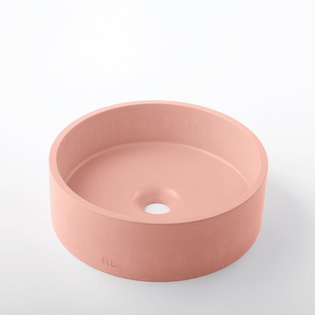 A mudd. concrete Odet Basin SM sink on a white surface.