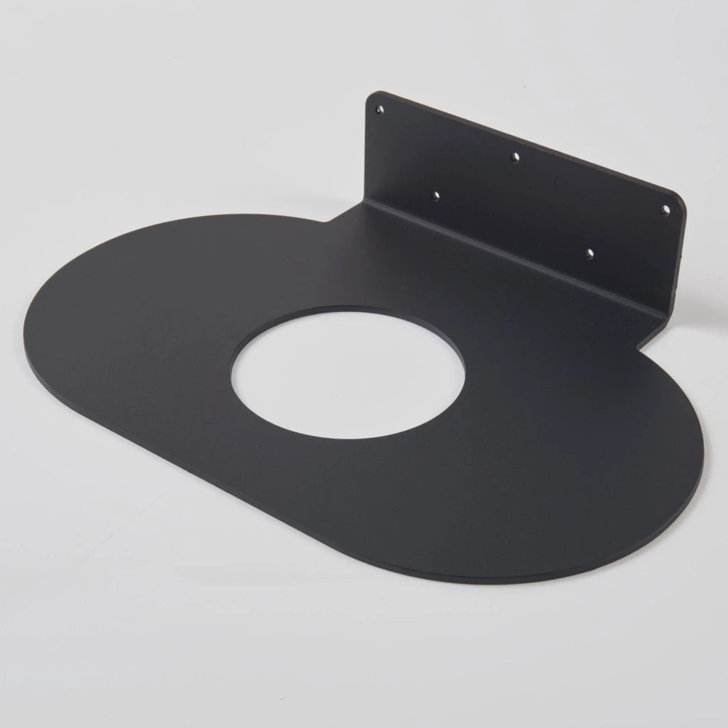 A black Parro Basin LG Affix toilet seat cover with a hole in the middle by mudd. concrete.