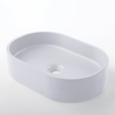 A Parro Basin SM sink by mudd. concrete on a white background.