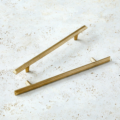 12" cabinet handles in bright bronze with modern shape.