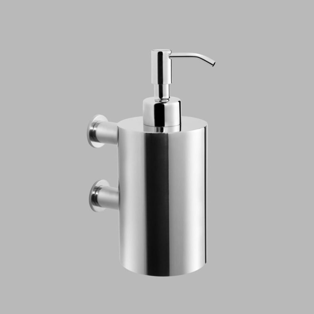 A d line Qtoo Uno Wall Mounted Soap Dispenser on a gray background.