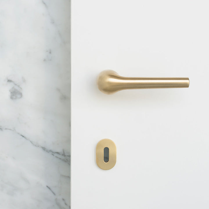 Modern Rene Door Lever Handle in Brass by Maison Vervloet