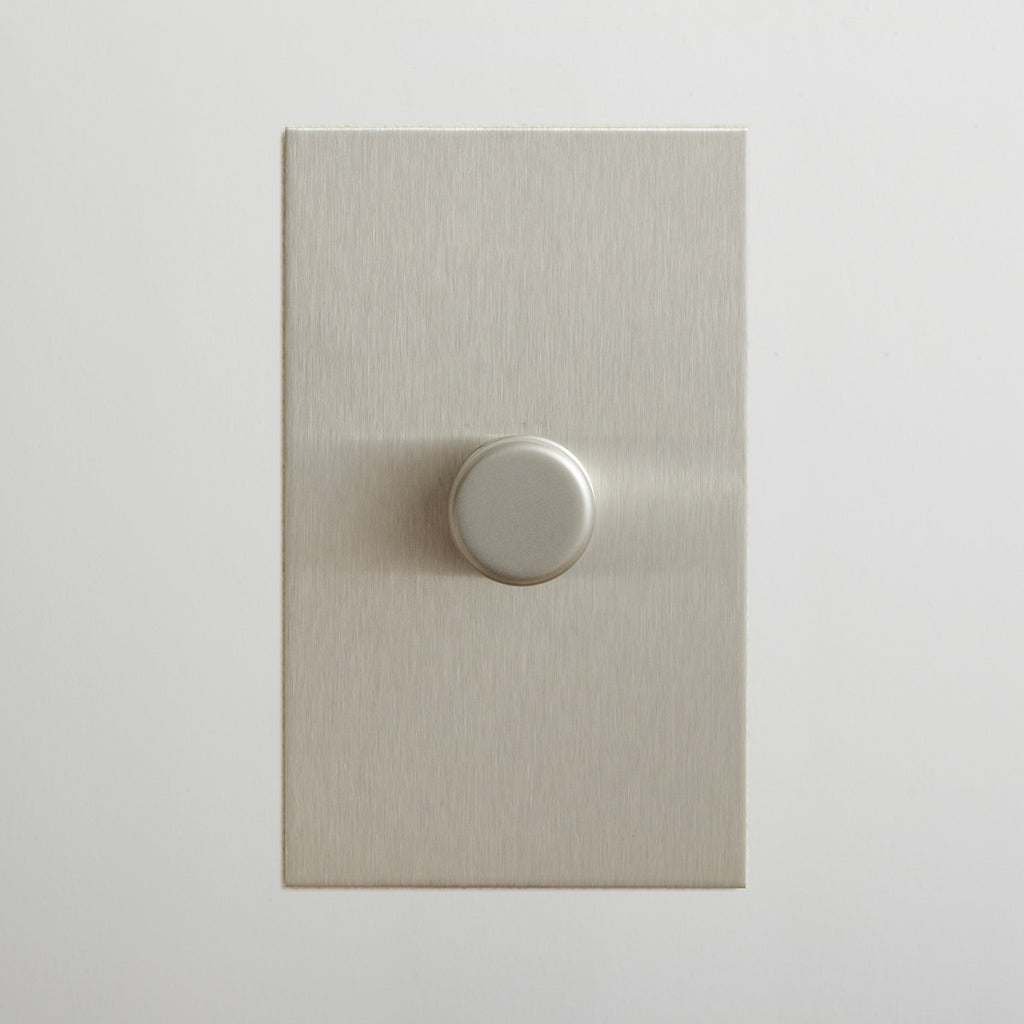 Forbes & Lomax rotary dimmer in brushed stainless steel.