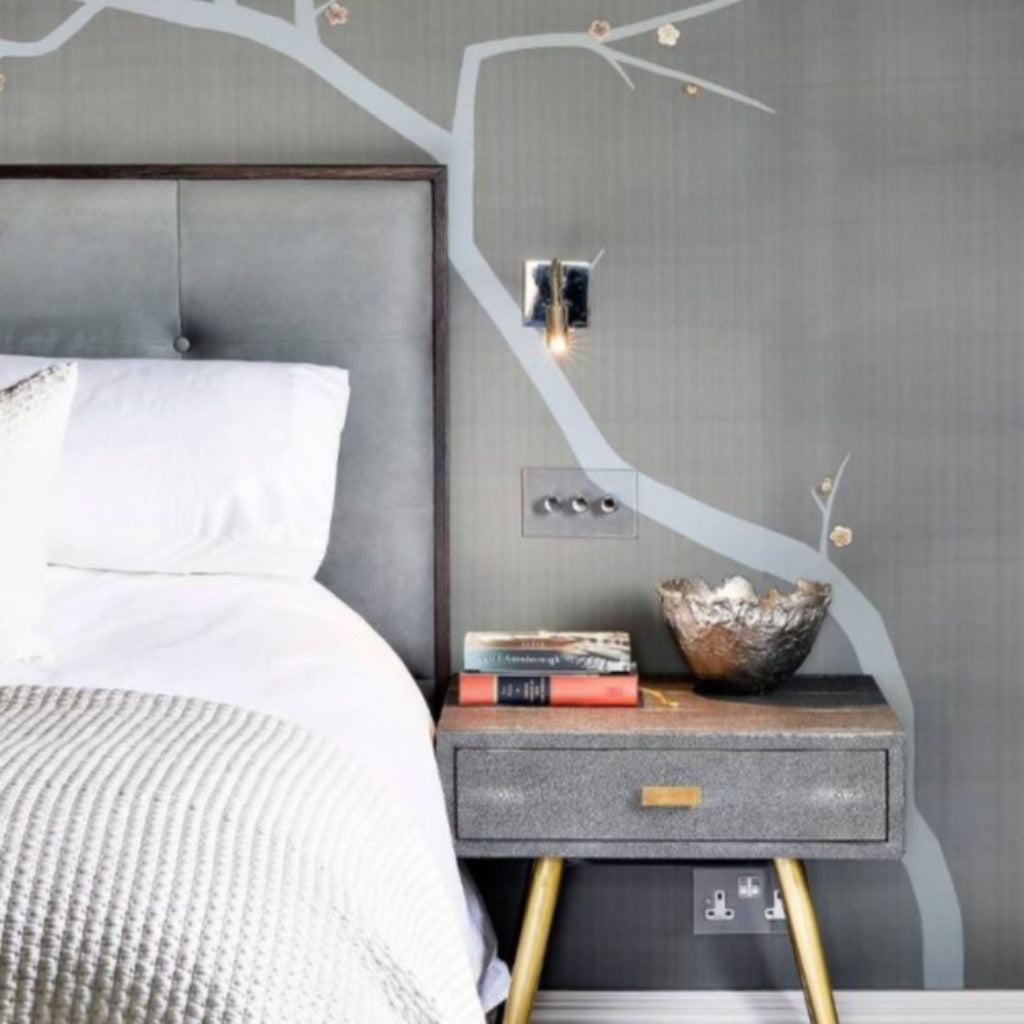 A bedroom with a Forbes & Lomax invisible plate rotary dimmer.