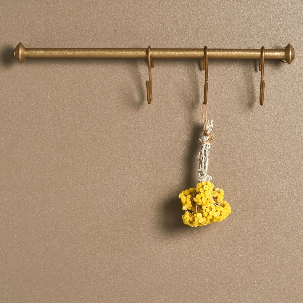 Spul Hanging Rack is a unique bronze casted hanging rod with a simplistic design.