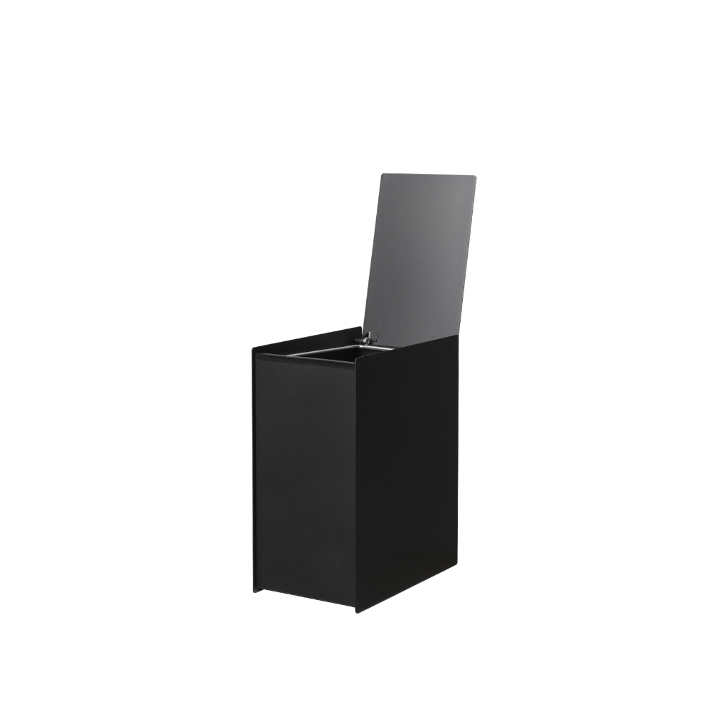 Ferm Living Sama Bin in black powder-coated steel with an open lid and removable inner bucket on a white background.