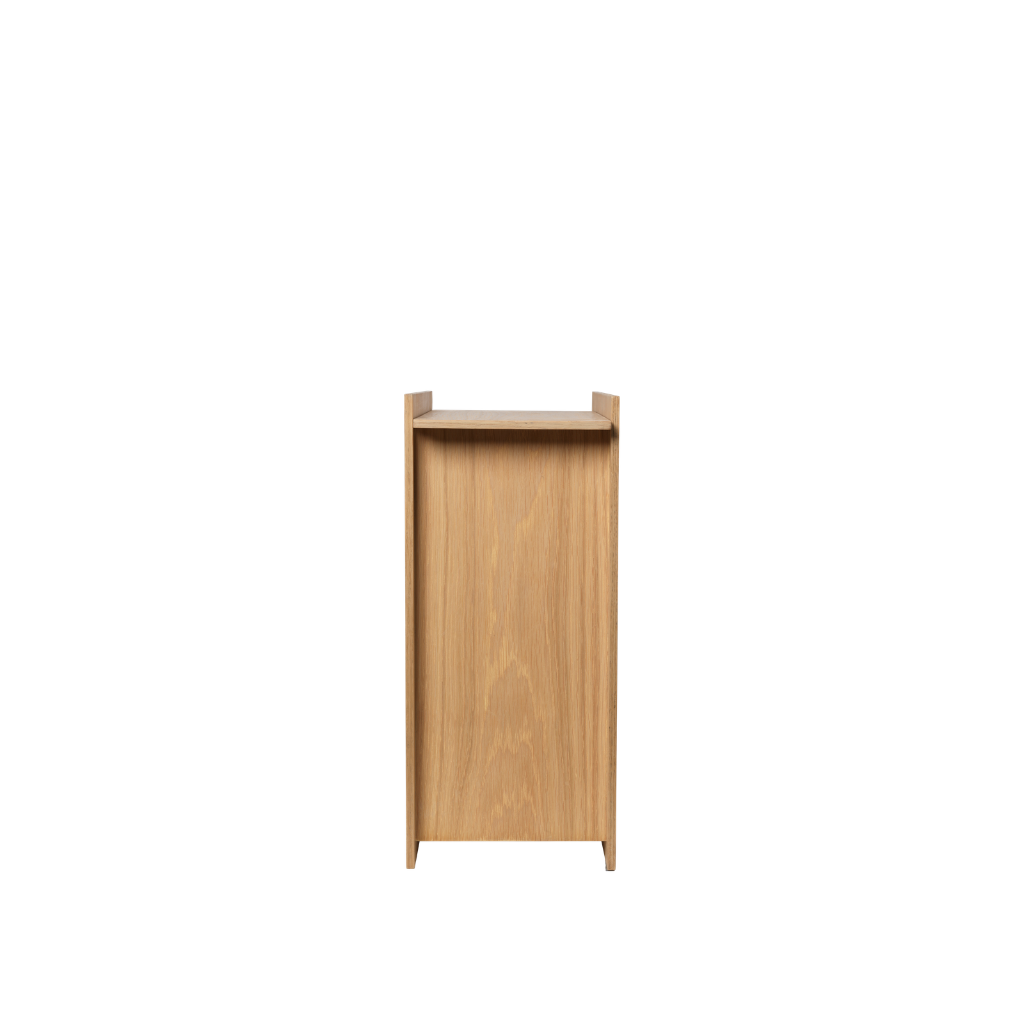 Ferm Living Sama bin in light oak veneer with a minimalist, geometric design against a white background.