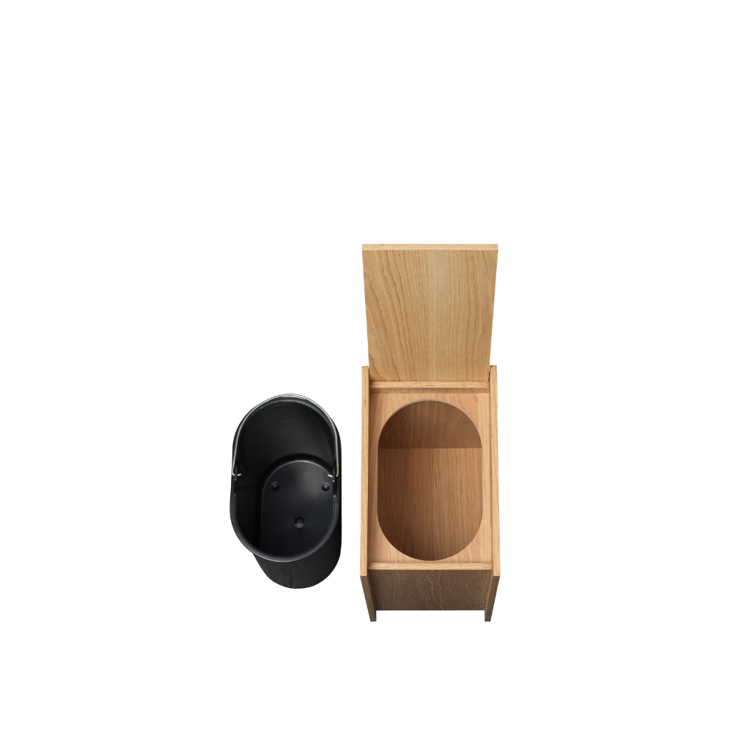 Ferm Living Sama wooden bin in oak veneer with a removable black plastic insert against a white background.