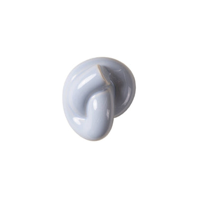 A blue ceramic wall hook or pull softly shaped like a cord tied into a knot with a creamy glossy glazed finish.