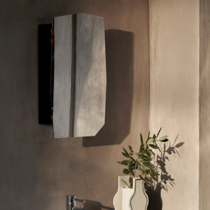 shard mirror cabinet on grey wall in bathroom