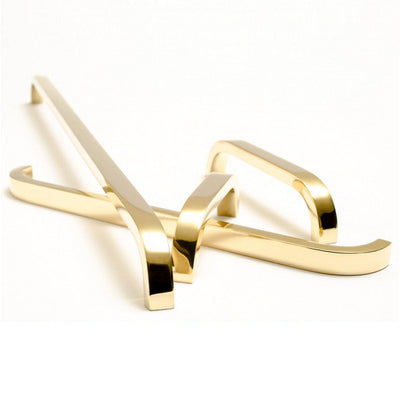 Slim, modern and elegant handles in brass