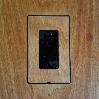 A DesignMod Smoothline Flush Mount Wall Plate: Alternate Material Mount on a wooden wall.