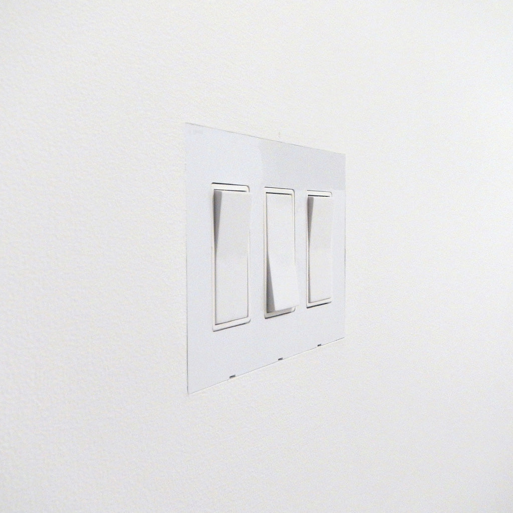Smoothline Flush recessed wall outlet plate. Minimal architectural detail. By Designmod