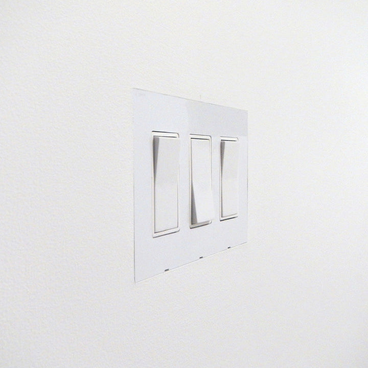 Smoothline Flush recessed wall outlet plate. Minimal architectural detail. By Designmod