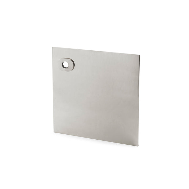 A Maison Vervloet Stardust Smooth Square Backplate with a hole in the middle.