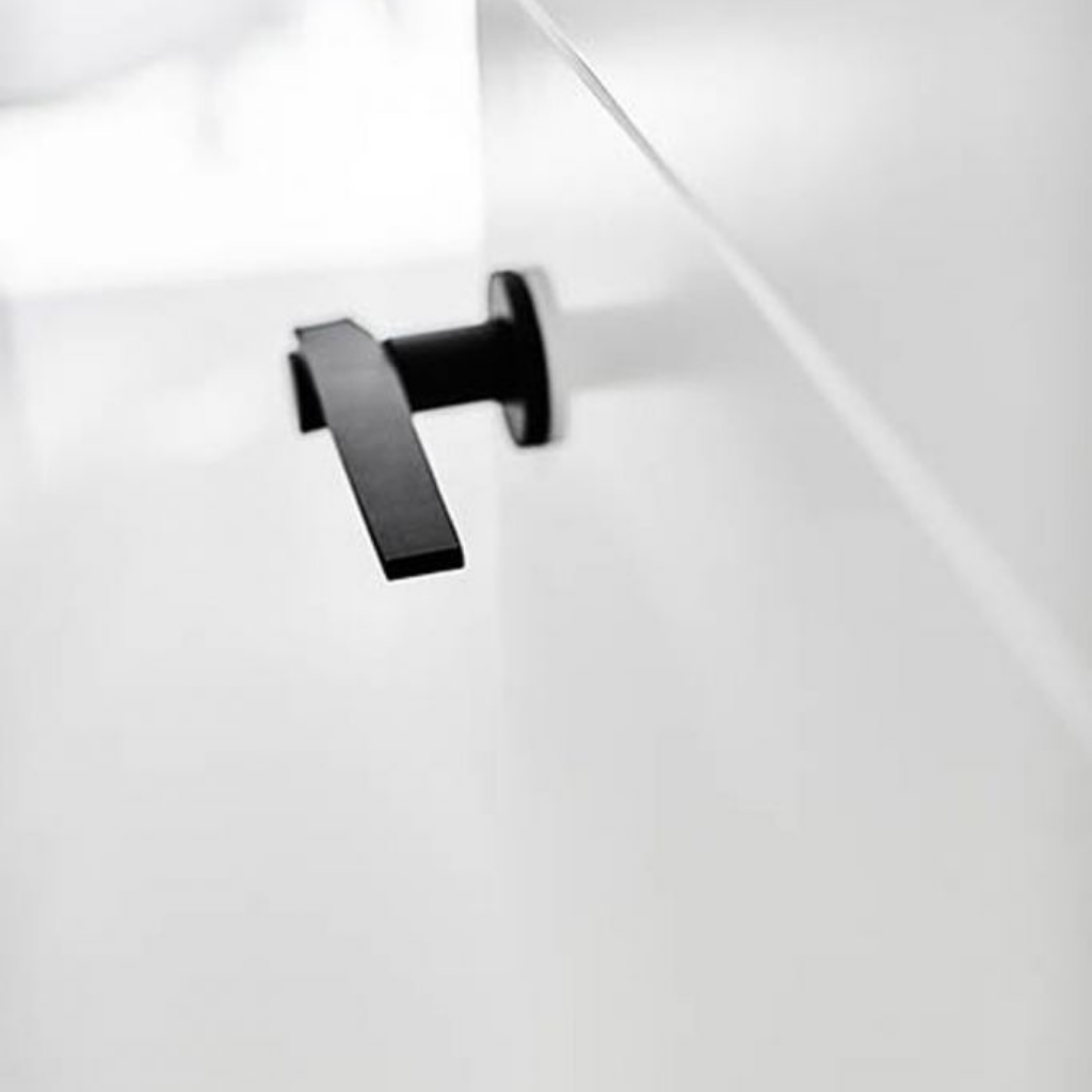 A close up of a Formani TENSE BB100G Door Lever on a door.