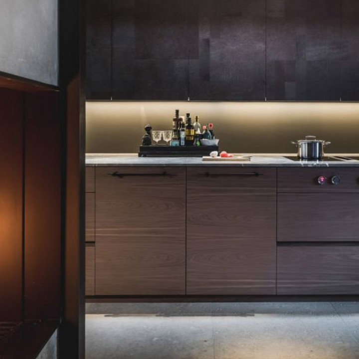 a kitchen with a Formani TENSE BB25 160/320 Cabinet Handle next to a sink.