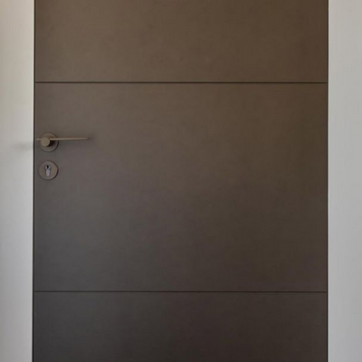 A Formani TENSE BBY53 Escutcheon door handle in a room.