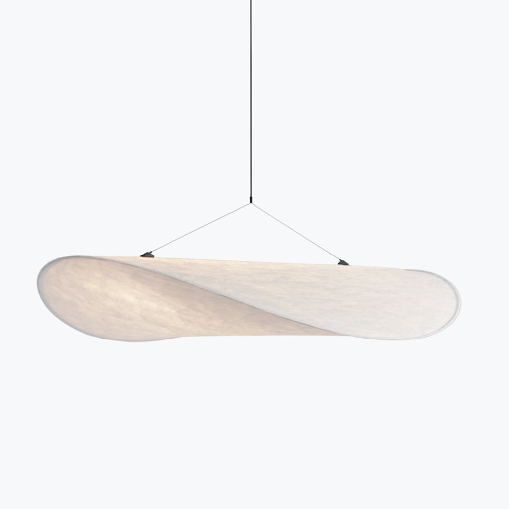 A New Works Tense Pendant Lamp hanging from a ceiling.