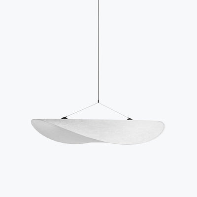 A New Works Tense Pendant Lamp hanging from a ceiling fixture.