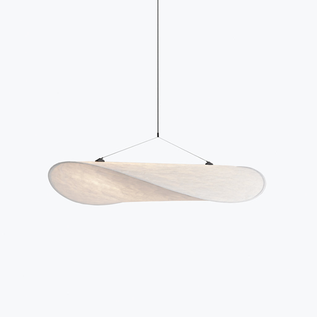 A New Works Tense Pendant Lamp hanging from a ceiling.