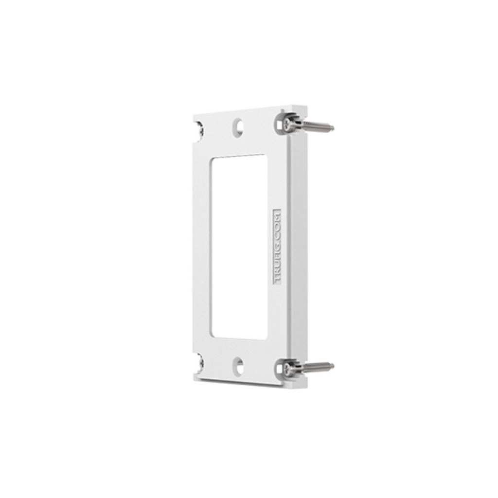 A white Trufig wall plate with two screws on it.