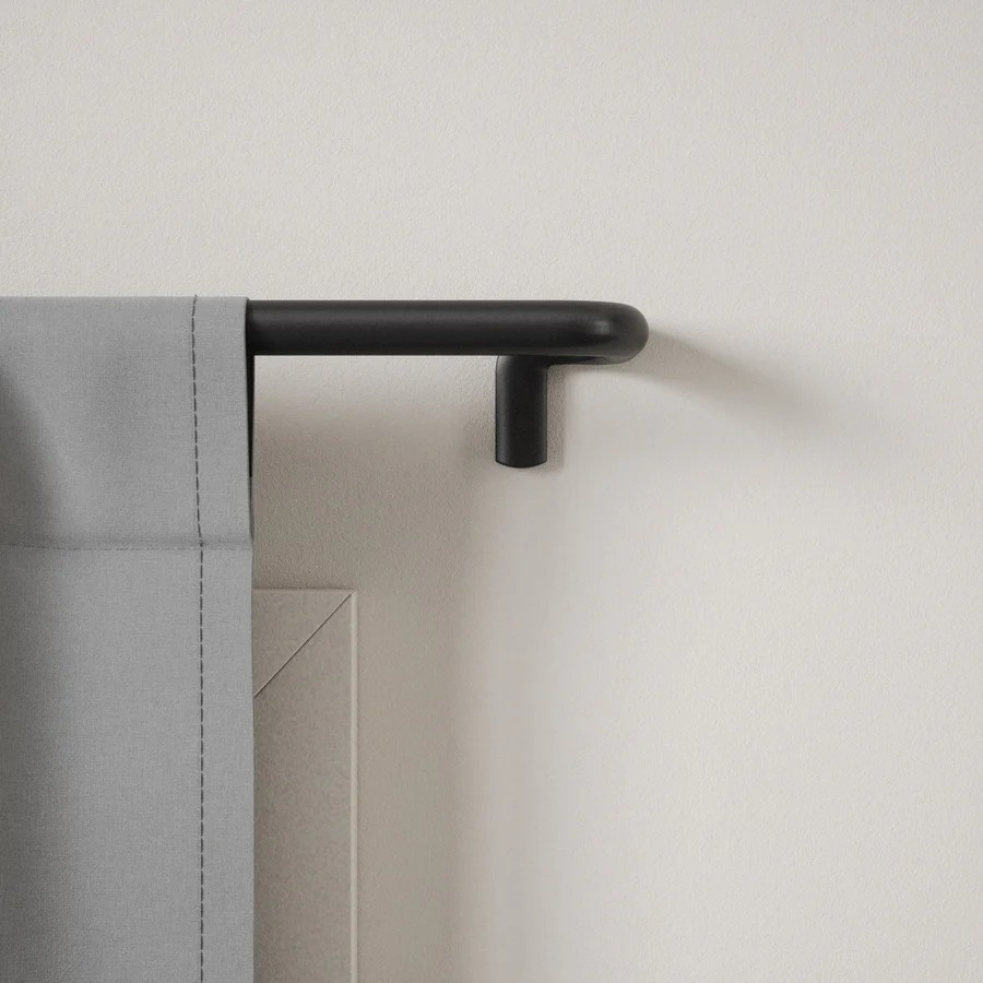 Twilight Curtain Rod seamlessly blends into any space while effectively blocking out light. The innovative wrap-around design ensures a snug fit against the wall, preventing light leakage.