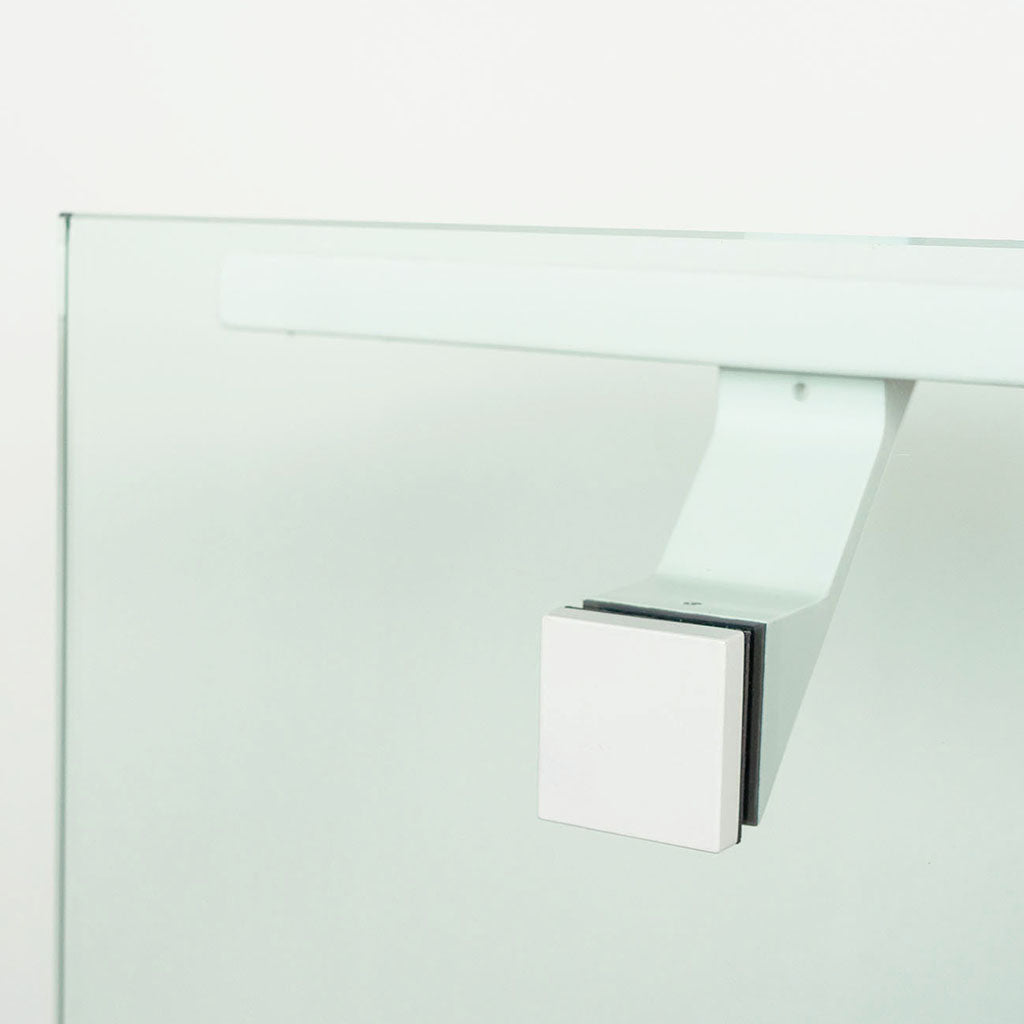 A close up of a mirror with a Componance VS Glass Mounted Bracket on it.