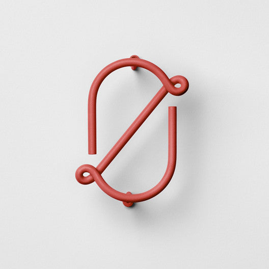 Neon style red house number made from bent steel.