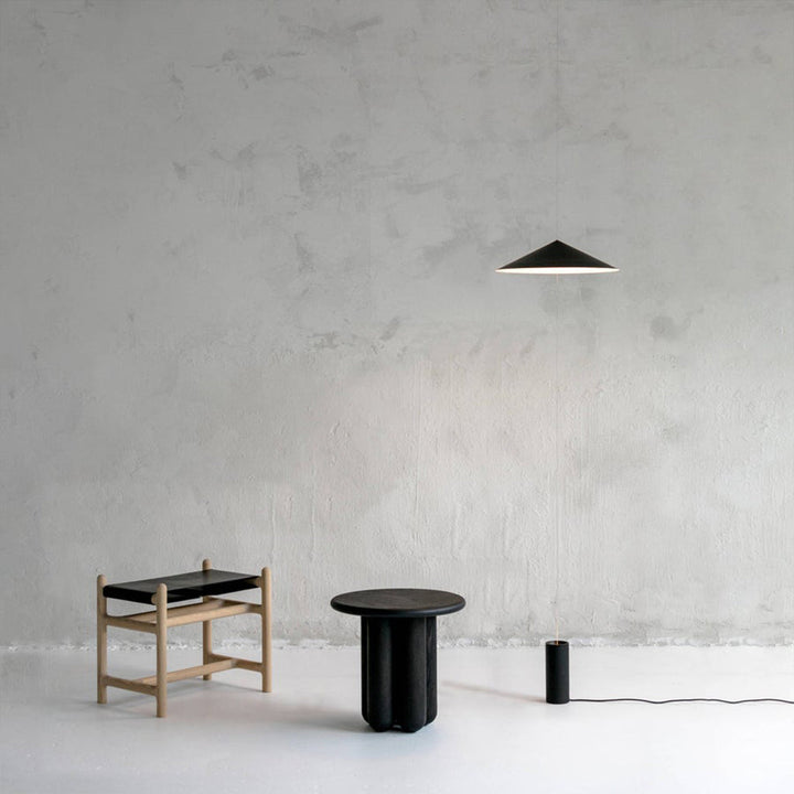 Wisp Suspension Light installed in a minimalist space