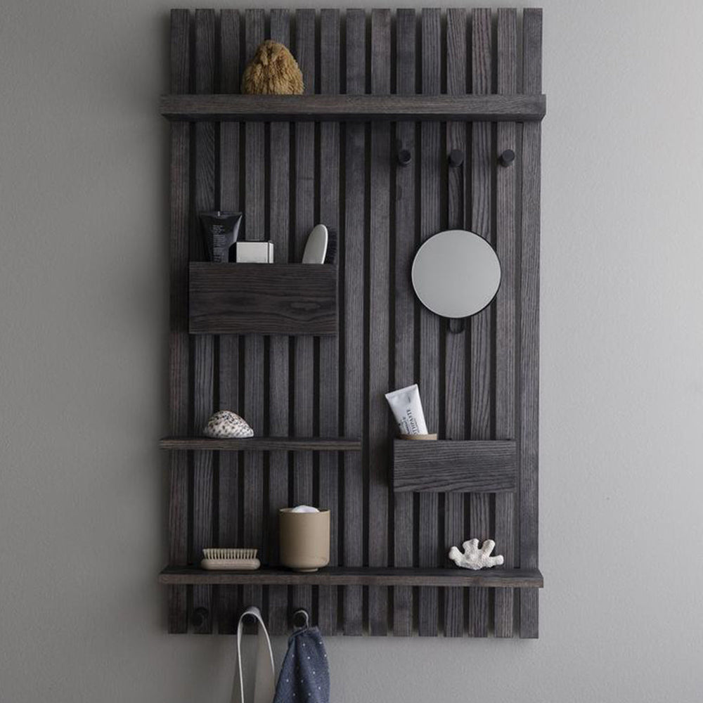 Blackened wood shelving unit