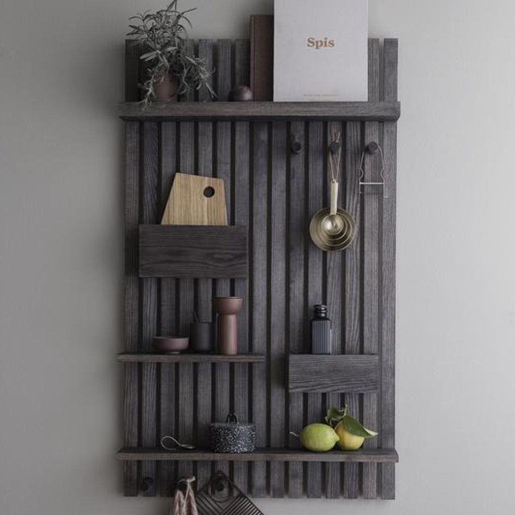 Blackened wood shelving unit