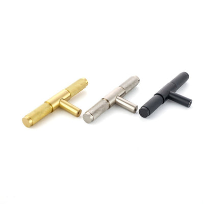 Wraith T-Bar Pull made from solid brass and finished in matte black, satin brass and satin silver