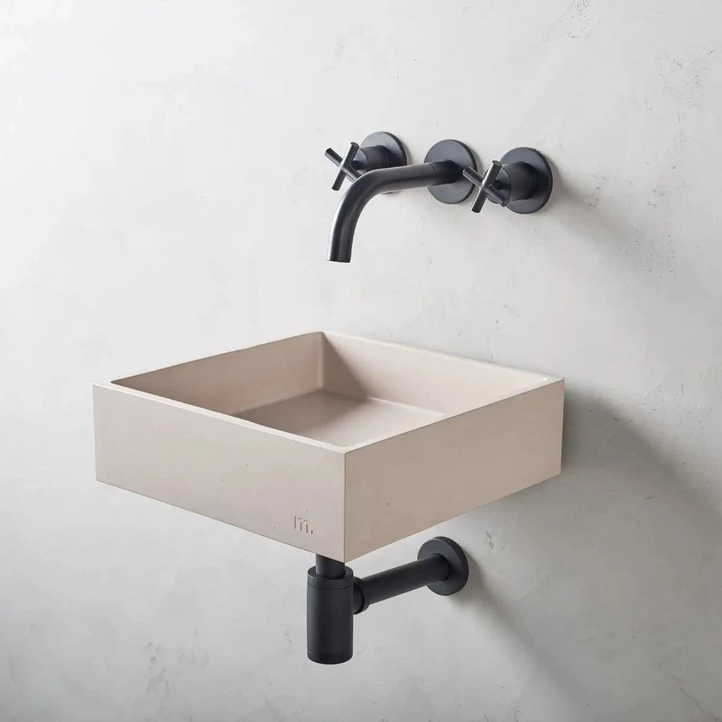 Sqaure wash basin with pale beige finish affixed to wall