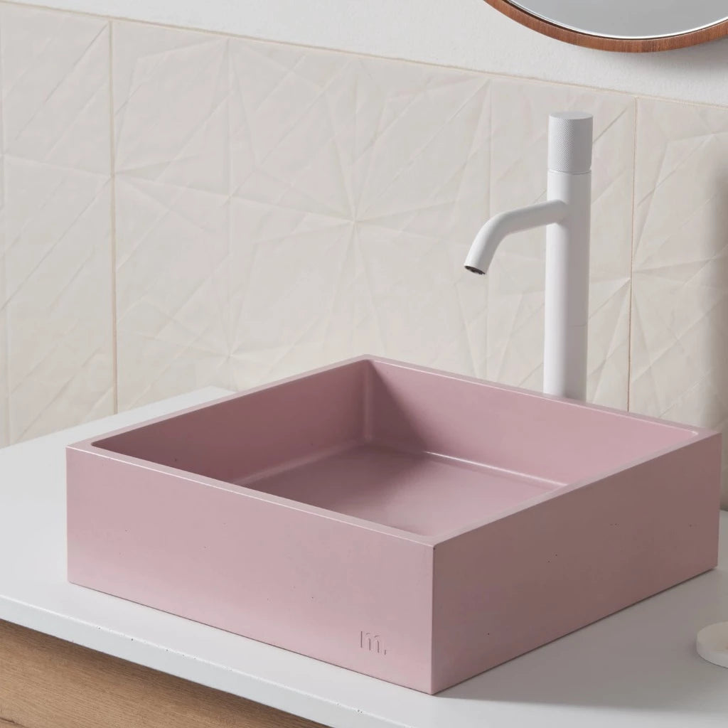 A mudd. concrete Yarra Basin SM bathroom sink with a soap dispenser and a mirror.