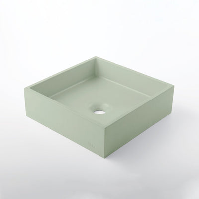 A mudd. concrete Yarra Basin SM sink in green square on a white background.