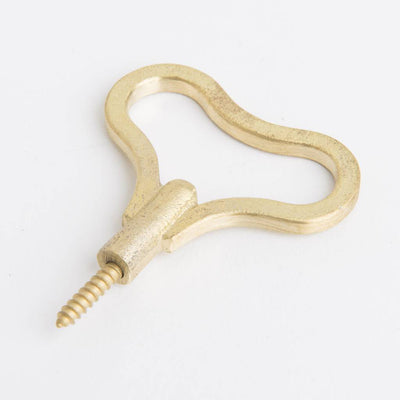 An Oji Masanori Zenmai Brass Hook with a screw.