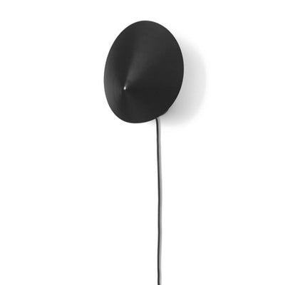 arum wall sconce in matte black on wall