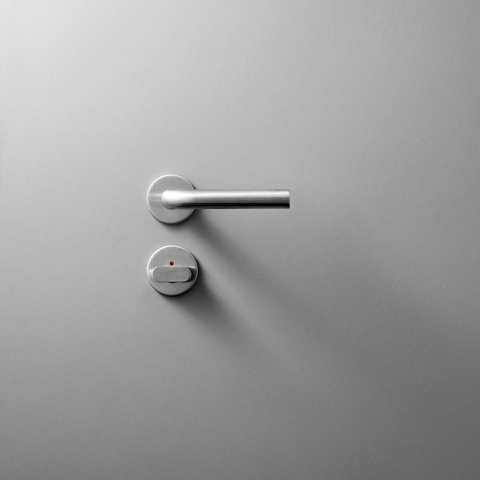Knud L Lever in satin stainless steel with knud toilet indicator thumb turn